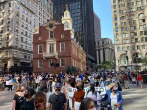 Indigenous Peoples Day March moving past the old State House in Boston